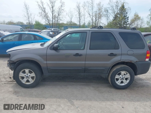 2005 Ford Escape XLT with VIN 1FMYU03115KB16214, listed as a IAAI auction lot 42113350 with 79,355 mi miles and . Bid and sale history available at DreamBid. Image 14.
