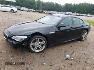 2017 BMW 6 Series 640i xDrive with VIN WBA6D2C58HGT66290, listed as a Copart auction lot 65738404 with 105,783 mi miles and Salvage Title. Bid and sale history available at carsss.com. Image 1.