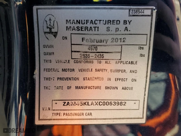 2012 Maserati GranTurismo S with VIN ZAM45KLAXC0063982, listed as a Copart auction lot 58490074 with 25,194 mi miles and Salvage Title. Bid and sale history available at carsss.com. Image 12.