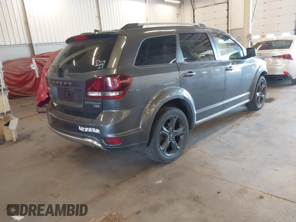 2019 Dodge Journey Crossroad z VIN 3C4PDCGG9KT717767, wystawiony jako IAAI lot #42179967 z przebiegiem 98 686 mil mil oraz . Historia ofert i sprzedaży dostępna na DreamBid. Obrazek 4.