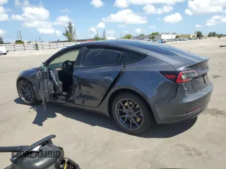 2023 Tesla Model 3 with VIN 5YJ3E1EA8PF704349, listed as a Copart auction lot 60220665 with 18,873 mi miles and Non repairable. Bid and sale history available at DreamBid. Image 2.