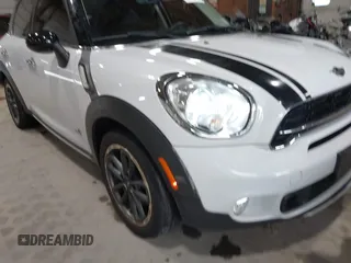 2016 MINI Countryman S with VIN WMWZC5C57GWU20085, listed as a IAAI auction lot 42403406 with 90,592 mi miles and . Bid and sale history available at DreamBid. Image 20.