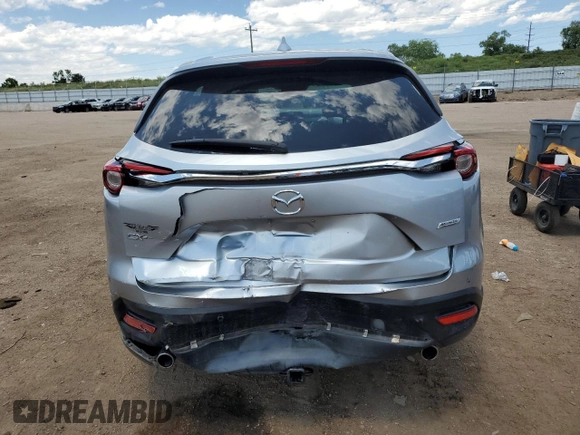 2016 Mazda CX-9 Grand Touring с VIN JM3TCADY2G0121026, выставлен на аукционе Copart как лот 60518105 с пробегом 104 923 миль миль и Списание • Salvage title. История ставок и продаж доступна на DreamBid. Изображение 6.