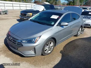 2020 Hyundai Elantra Value Edition with VIN 5NPD84LFXLH615311, listed as a IAAI auction lot 41219798 with 77,300 mi miles. Bid and sale history available at carsss.com. Image 2.