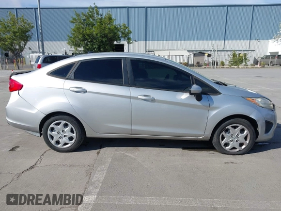 2012 Ford Fiesta SE with VIN 3FADP4BJ2CM150953, listed as a IAAI auction lot 42010904 with 77,637 mi miles. Bid and sale history available at carsss.com. Image 13.