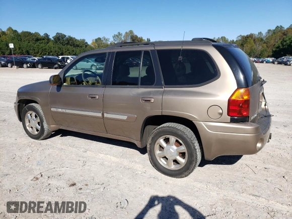 2002 GMC Envoy SLT with VIN 1GKDT13S022456264, listed as a Copart auction lot 76556004 with 230,954 mi miles and Salvage Title. Bid and sale history available at DreamBid. Image 2.