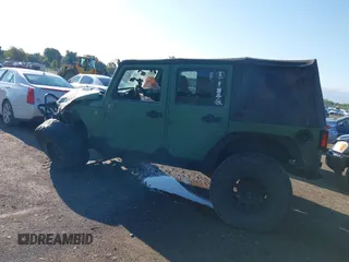 2008 Jeep Wrangler Unlimited X z VIN 1J4GA39198L612727, wystawiony jako IAAI lot #40128925 z przebiegiem 260 573 mil mil oraz . Historia ofert i sprzedaży dostępna na DreamBid. Obrazek 3.