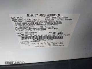 2014 Ford Taurus SEL with VIN 1FAHP2E88EG127074, listed as a IAAI auction lot 41688975 with 186,650 mi miles. Bid and sale history available at carsss.com. Image 9.