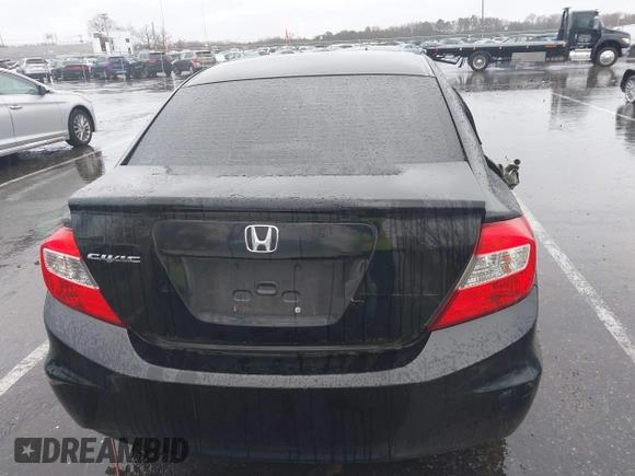 2012 Honda Civic LX with VIN 2HGFB2F5XCH605230, listed as a IAAI auction lot 41999663 with 221,815 mi miles and . Bid and sale history available at DreamBid. Image 16.