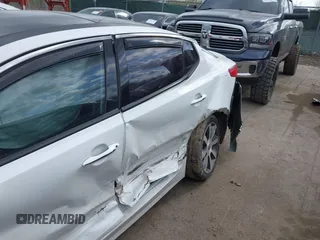 2012 Kia Optima SX with VIN 5XXGR4A6XCG079419, listed as a IAAI auction lot 41989957 with 159,794 mi miles and . Bid and sale history available at carsss.com. Image 6.
