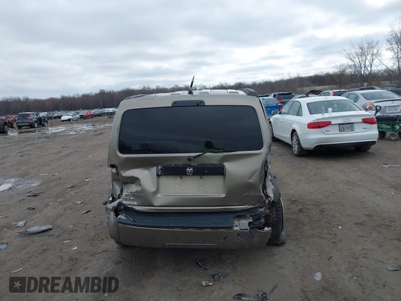 2007 Dodge Nitro SLT z VIN 1D8GU58K97W700047, wystawiony jako IAAI lot #41805822 z przebiegiem 186 604 mil mil oraz . Historia ofert i sprzedaży dostępna na DreamBid. Obrazek 15.