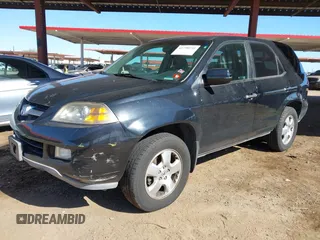 2004 Acura MDX with VIN 2HNYD18244H560067, listed as a IAAI auction lot 41798950 with 175,460 mi miles. Bid and sale history available at carsss.com. Image 2.