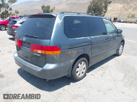 2003 Honda Odyssey EX z VIN 5FNRL18683B097760, wystawiony jako IAAI lot #42479209 z przebiegiem 126 470 mil mil oraz . Historia ofert i sprzedaży dostępna na DreamBid. Obrazek 4.