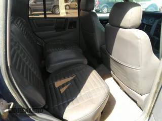 1994 Jeep Grand Cherokee Laredo with VIN 1J4GZ58Y3RC202638, listed as a IAAI auction lot 41885484 with 164,481 mi miles. Bid and sale history available at carsss.com. Image 8.