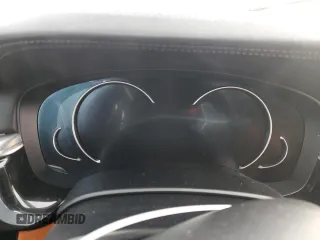 2018 BMW M5 z VIN WBSJF0C56JB282184, wystawiony jako Copart lot #87480414 z przebiegiem Nie podano mil oraz Szkody całkowita. Historia ofert i sprzedaży dostępna na DreamBid. Obrazek 9.