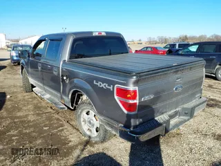 2014 Ford F-150 XL with VIN 1FTFW1EF7EKD93048, listed as a IAAI auction lot 41443576 with 167,124 mi miles. Bid and sale history available at carsss.com. Image 3.
