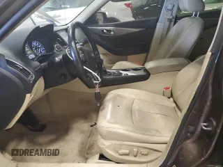 2014 Infiniti Q50 Hybrid Sport with VIN JN1AV7AR9EM702123, listed as a Copart auction lot 50310765 with 134,433 mi miles and Salvage Title. Bid and sale history available at DreamBid. Image 7.