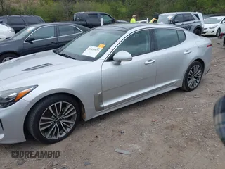 2018 Kia Stinger Premium with VIN KNAE25LA2J6036690, listed as a IAAI auction lot 41838574 with 113,109 mi miles. Bid and sale history available at carsss.com. Image 2.