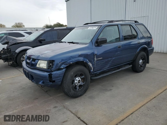 2003 Isuzu Rodeo z VIN 4S2DM58W234305979, wystawiony jako Copart lot #81346314 z przebiegiem 177 272 mil mil oraz Szkody całkowita. Historia ofert i sprzedaży dostępna na DreamBid. Obrazek 1.