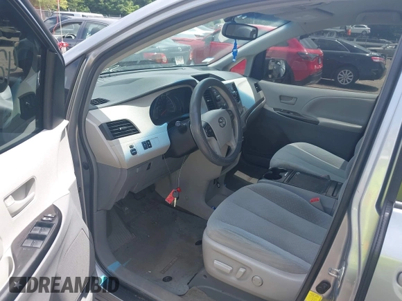 2013 Toyota Sienna LE with VIN 5TDJK3DC9DS054310, listed as a IAAI auction lot 42668103 with 209,712 mi miles and . Bid and sale history available at DreamBid. Image 5.