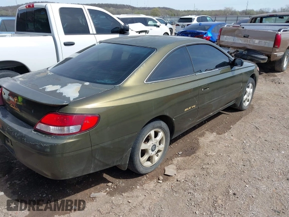 1999 Toyota Solara SE with VIN 2T1CF22PXXC247611, listed as a IAAI auction lot 41863240 with 153,823 mi miles. Bid and sale history available at carsss.com. Image 4.