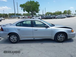 2004 Pontiac Grand Am SE1 z VIN 1G2NF52F34M504774, wystawiony jako IAAI lot #42188471 z przebiegiem 148 727 mil mil oraz . Historia ofert i sprzedaży dostępna na DreamBid. Obrazek 13.