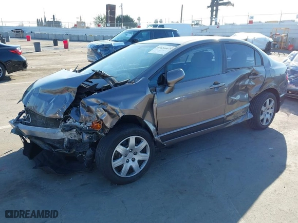 2011 Honda Civic Sdn LX with VIN 19XFA1F54BE048532, listed as a IAAI auction lot 41636667 with 117,065 mi miles. Bid and sale history available at carsss.com. Image 2.