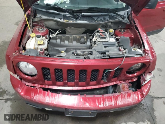 2014 Jeep Patriot Latitude with VIN 1C4NJRFB7ED855780, listed as a Copart auction lot 57246515 with 110,433 mi miles and Salvage title. Bid and sale history available at DreamBid. Image 12.