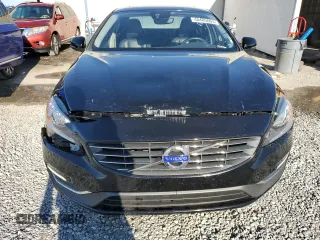 2015 Volvo S60 T5 Drive-E Premier with VIN YV140MFK4F2338462, listed as a Copart auction lot 48485665 with 57,695 mi miles and Salvage title. Bid and sale history available at DreamBid. Image 5.