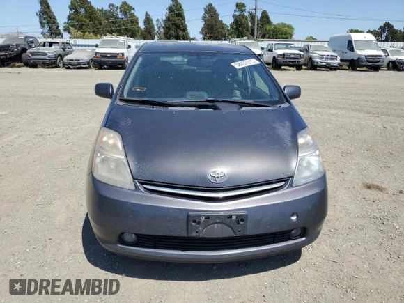 2007 Toyota Prius z VIN JTDKB20U473211597, wystawiony jako Copart lot #58437915 z przebiegiem 252 737 mil mil oraz Szkoda całkowita • Salvage title. Historia ofert i sprzedaży dostępna na DreamBid. Obrazek 5.