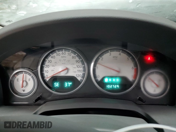 2010 Dodge Grand Caravan Crew with VIN 2D4RN6DX9AR390514, listed as a Copart auction lot 50906305 with 102,729 mi miles and Clean Title. Bid and sale history available at DreamBid. Image 9.