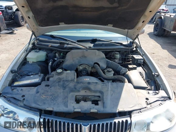 2002 Lincoln Town Car Executive z VIN 1LNHM81W12Y620302, wystawiony jako IAAI lot #41952738 z przebiegiem 83 062 mil mil oraz . Historia ofert i sprzedaży dostępna na DreamBid. Obrazek 10.