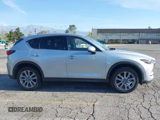 2021 Mazda CX-5 Grand Touring with VIN JM3KFADM1M1393251, listed as a IAAI auction lot 42072862 with 47,758 mi miles. Bid and sale history available at carsss.com. Image 13.