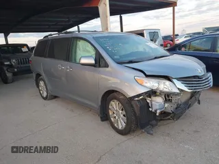 2016 Toyota Sienna LE with VIN 5TDJK3DC4GS133694, listed as a IAAI auction lot 41171171 with 99,680 mi miles. Bid and sale history available at carsss.com. Image 1.