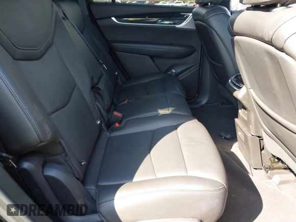 2023 Cadillac XT6 AWD Premium Luxury with VIN 1GYKPDRS8PZ153838, listed as a IAAI auction lot 41838527 with 60,034 mi miles and . Bid and sale history available at DreamBid. Image 8.