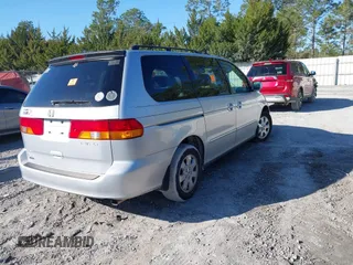 2004 Honda Odyssey EX-L with VIN 5FNRL189X4B012106, listed as a IAAI auction lot 41400222 with 229,674 mi miles and . Bid and sale history available at DreamBid. Image 4.