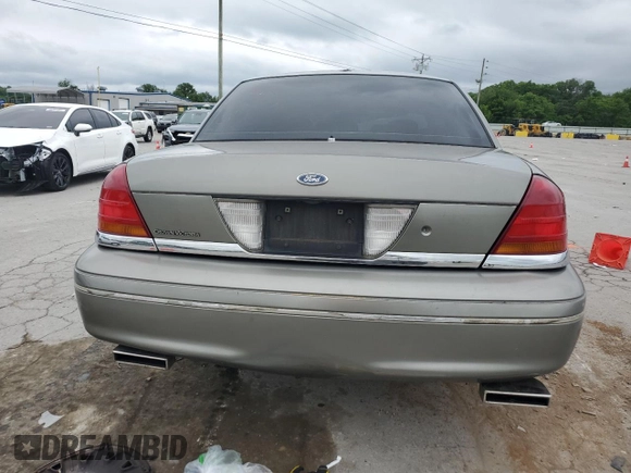 2003 Ford Police Interceptor Street Appear with VIN 2FAFP71W83X132646, listed as a Copart auction lot 55864205 with 211,073 mi miles and Salvage title. Bid and sale history available at DreamBid. Image 6.