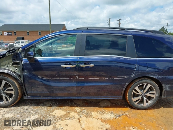 2022 Honda Odyssey Touring with VIN 5FNRL6H86NB004865, listed as a IAAI auction lot 42254009 with 47,229 mi miles and . Bid and sale history available at DreamBid. Image 14.