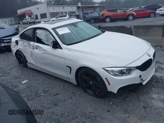2014 BMW 4 Series 428i with VIN WBA3N7C52EF718794, listed as a IAAI auction lot 41416632 with 179,681 mi miles and . Bid and sale history available at carsss.com. Image 1.