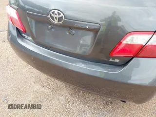 2009 Toyota Camry with VIN 4T1BE46K19U822477, listed as a IAAI auction lot 42052700 with 218,509 mi miles. Bid and sale history available at carsss.com. Image 12.