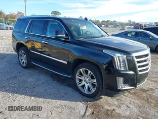 2018 Cadillac Escalade Luxury z VIN 1GYS3BKJ7JR291430, wystawiony jako IAAI lot #41449233 z przebiegiem 128 281 mil mil oraz . Historia ofert i sprzedaży dostępna na DreamBid. Obrazek 1.