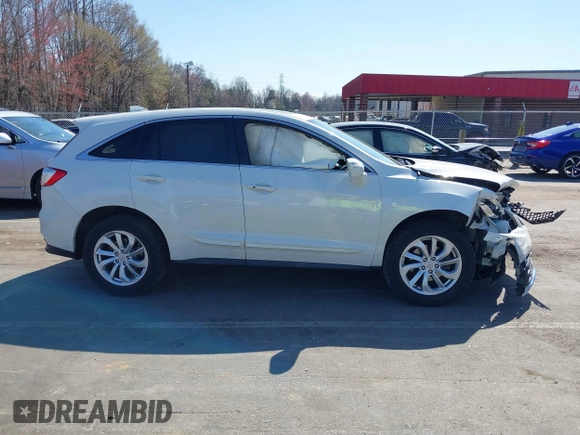 2016 Acura RDX Technology with VIN 5J8TB4H54GL009695, listed as a IAAI auction lot 41784860 with 115,184 mi miles and . Bid and sale history available at DreamBid. Image 13.