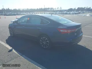 2016 Toyota Avalon Hybrid XLE Premium with VIN 4T1BD1EB2GU052127, listed as a IAAI auction lot 41737260 with 266,841 mi miles. Bid and sale history available at carsss.com. Image 3.