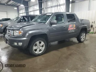 2011 Honda Ridgeline RTL with VIN 5FPYK1F52BB006545, listed as a Copart auction lot 50235045 with 207,050 mi miles and Salvage Title. Bid and sale history available at carsss.com. Image 1.