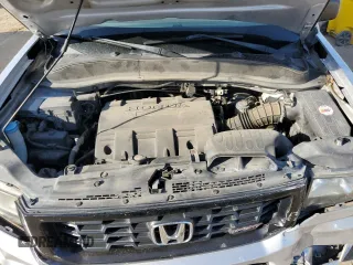 2012 Honda Ridgeline Sport with VIN 5FPYK1F77CB456114, listed as a Copart auction lot 75874274 with 212,379 mi miles and Salvage Title. Bid and sale history available at carsss.com. Image 12.