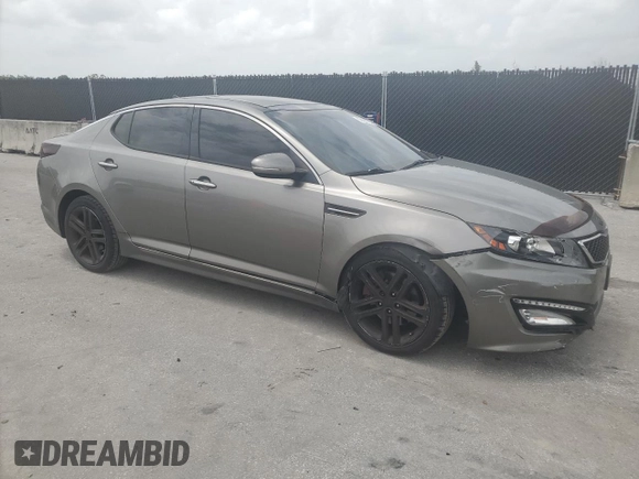 2013 Kia Optima SX with VIN 5XXGR4A62DG116593, listed as a Copart auction lot 59696705 with 120,248 mi miles and Salvage title. Bid and sale history available at DreamBid. Image 4.