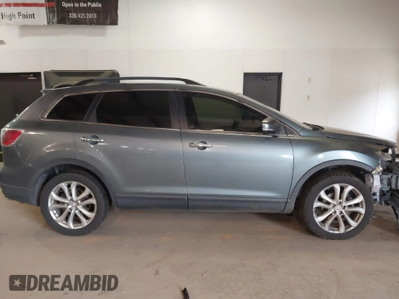 2012 Mazda CX-9 Grand Touring with VIN JM3TB3DV6C0360304, listed as a IAAI auction lot 41509627 with 163,986 mi miles. Bid and sale history available at carsss.com. Image 13.