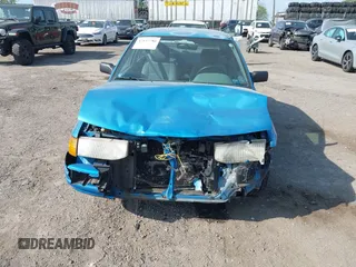 1994 Ford Escort z VIN 1FARP14J1RW244851, wystawiony jako IAAI lot #42157786 z przebiegiem 73 095 mil mil oraz . Historia ofert i sprzedaży dostępna na DreamBid. Obrazek 13.