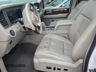 2014 Lincoln Navigator z VIN 5LMJJ2J51EEL08112, wystawiony jako Copart lot #54723164 z przebiegiem 135 575 mil mil oraz Szkoda całkowita • Salvage title. Historia ofert i sprzedaży dostępna na DreamBid. Obrazek 7.