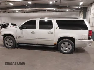 2010 Chevrolet Suburban LTZ with VIN 1GNUKKE31AR290571, listed as a IAAI auction lot 40948006 with 163,758 mi miles. Bid and sale history available at carsss.com. Image 13.
